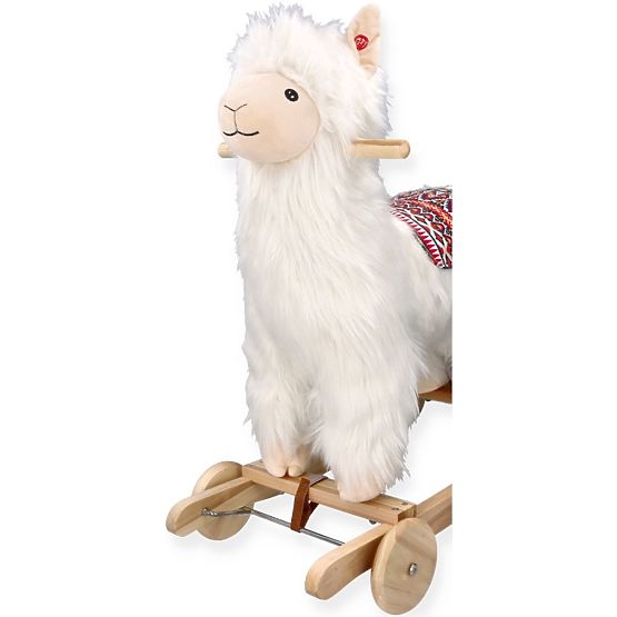 Alpaka auf Schaukelpferd mit Rädern
